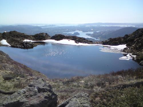a view of a lake on top of a mountain at Central location in the heart of historic Bergen in Bergen