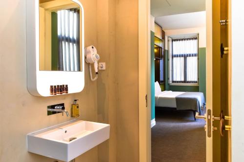 Et badeværelse på My Story Hotel Augusta