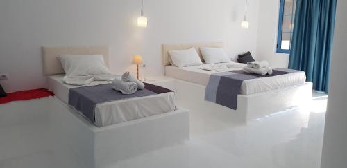 Un ou plusieurs lits dans un hébergement de l'établissement Cava Boutique Hotel