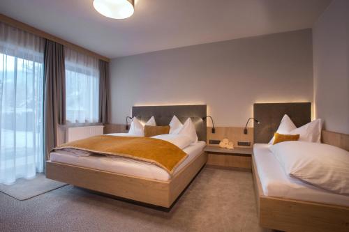 Ein Bett oder Betten in einem Zimmer der Unterkunft Birkenhof