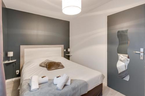 Ένα ή περισσότερα κρεβάτια σε δωμάτιο στο Osemae Immobilier - Redon Port-Chatelêt