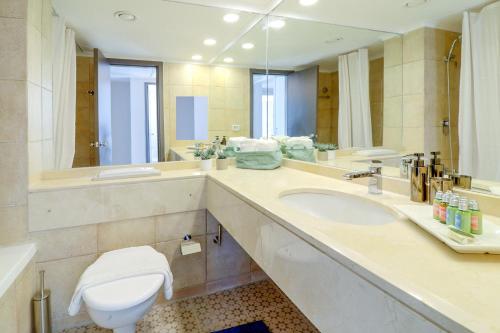 A bathroom at master Haifa Beach Apartments