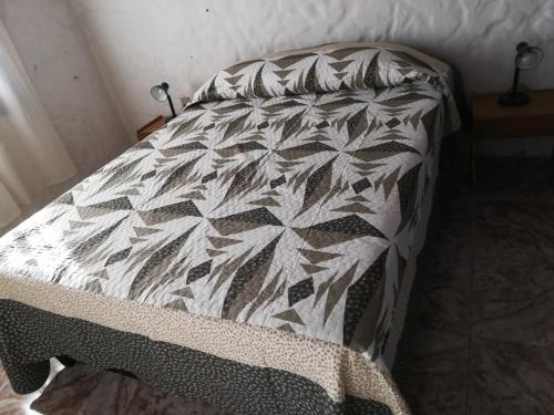 Una cama o camas en una habitación de Casa Benjaim