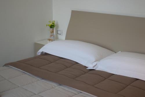 Postel nebo postele na pokoji v ubytování Il Borgo