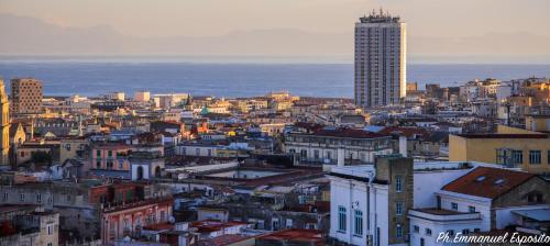 a view of a city with a tall building at B&B Nel Regno di Napoli in Naples