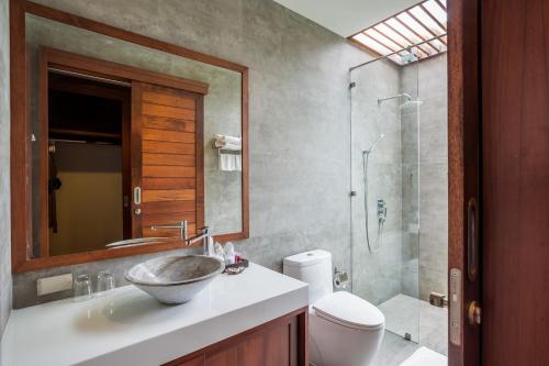 a bathroom with a sink and a toilet and a shower at Villa Palavee (A2) in Ao Nang Beach