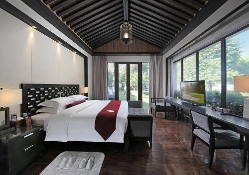 Katil atau katil-katil dalam bilik di Elite Spring Villas