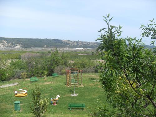 a park with a playground in the grass at Il Terrazzo Sul Sinni in Rotondella