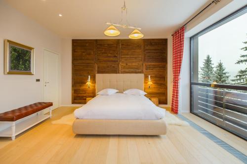 Ένα ή περισσότερα κρεβάτια σε δωμάτιο στο Forest apartment Silver Mountain resort