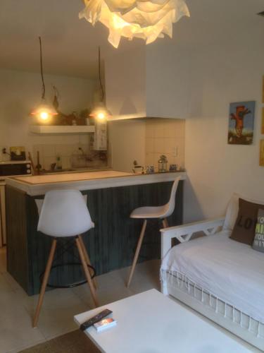 Katil atau katil-katil dalam bilik di Apartamentos El Pintor