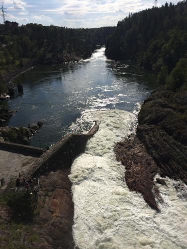 a view of a river from a bridge at Hotell Bele in Trollhättan