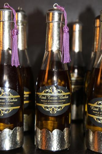 a group of bottles of beer on a table at Riad Terra Bahia in Marrakech