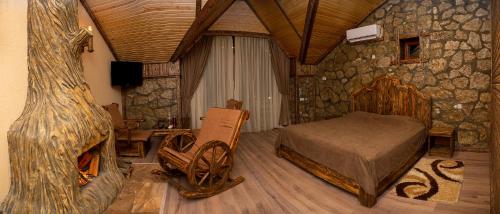 A bed or beds in a room at Getahovit Resort