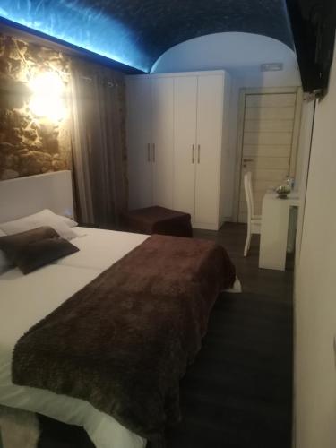 Ένα ή περισσότερα κρεβάτια σε δωμάτιο στο Casa O Gures