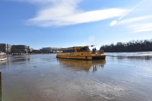 a yellow boat in the water on a river at The Georgetown House Inn in Washington