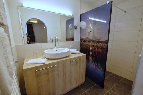 Ein Badezimmer in der Unterkunft Aktiv Hotel Karnia