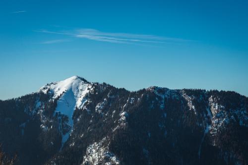 an aerial view of a snow covered mountain at Hotel Jasná in Demanovska Dolina