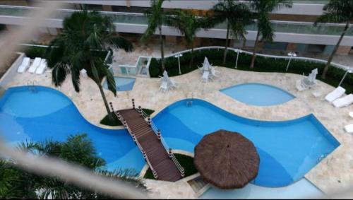 Πισίνα στο ή κοντά στο Paraíso na Riviera São Lourenço - Laguna Home Resort