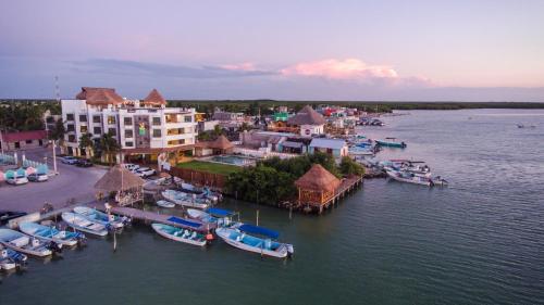 an aerial view of a marina with boats in the water at Hotel Rio Lagartos in Río Lagartos