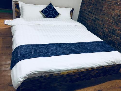 Postel nebo postele na pokoji v ubytování Mintu Home
