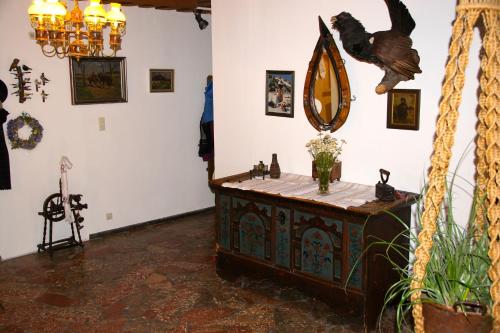 a room with a dressing table with a mirror at Haus Lisa in Fuschl am See