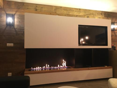 TV a/nebo společenská místnost v ubytování Verbier Medran + Private Sauna