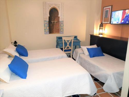 Una cama o camas en una habitación de La Esperanza