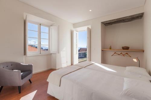 Postel nebo postele na pokoji v ubytování A Bica Hostel