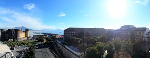 a view of a city with trees and buildings at B&B Musica e Mare in Naples