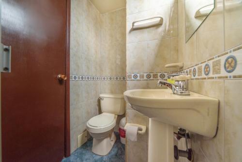 Vannituba majutusasutuses Hotel Elegant Suite