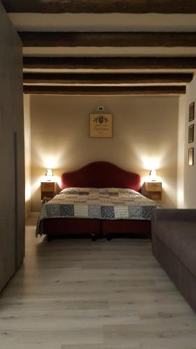 Ristorante Albergo Corona tesisinde bir odada yatak veya yataklar