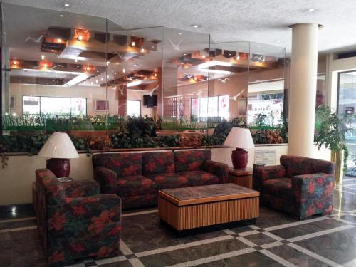 Posezení v ubytování Hotel Fleming