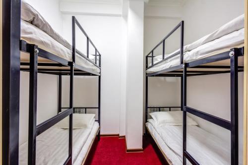 Katil atau katil-katil dalam bilik di WHITE HOTEL & HOSTEL