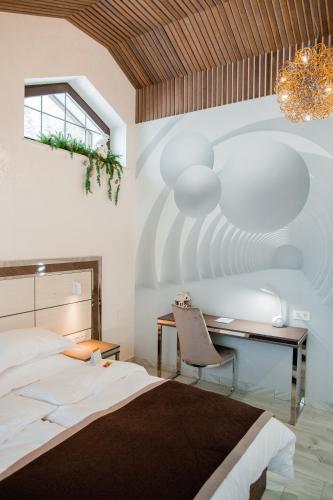 Кровать или кровати в номере Chalet TwoSeasons Bukovel