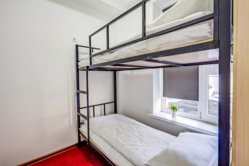 Katil atau katil-katil dalam bilik di WHITE HOTEL & HOSTEL