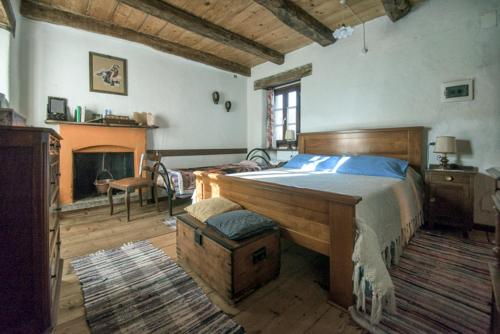 Ein Bett oder Betten in einem Zimmer der Unterkunft l'Oca Mannara