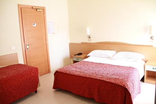 Postel nebo postele na pokoji v ubytování c-hotels International