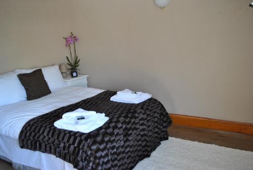 Katil atau katil-katil dalam bilik di Amber Guesthouse