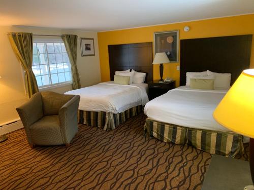 Cama o camas de una habitación en Four Winds Country Motel