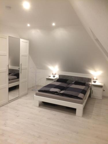 Ένα ή περισσότερα κρεβάτια σε δωμάτιο στο Töfte Bude