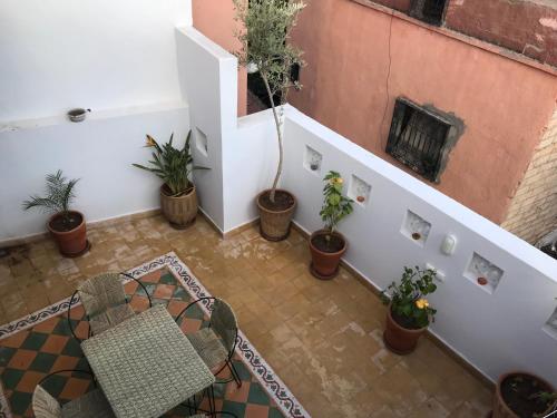 Un balcón o terraza en Riad Medina