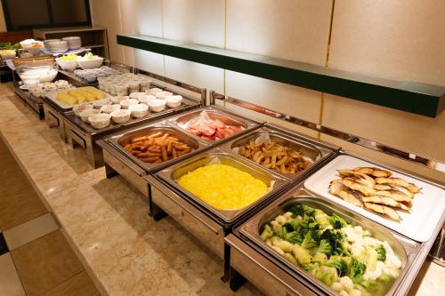a buffet line with many different types of food at Kumamoto Washington Hotel Plaza in Kumamoto