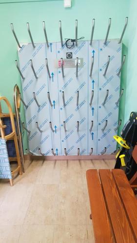 a room with a bunch of metal drawers at Pension Haus Rohrmoser in Annaberg im Lammertal