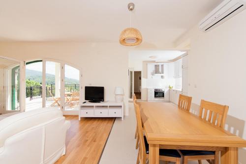 Kuchyň nebo kuchyňský kout v ubytování Apartment Olivia