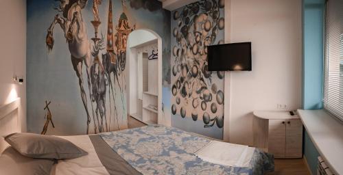 Säng eller sängar i ett rum på Hostel DeArt