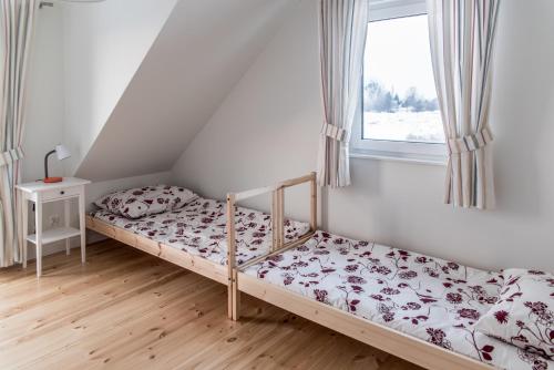 Кровать или кровати в номере Na Fali