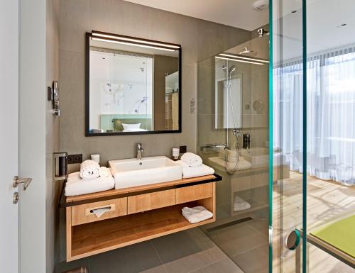 Koupelna v ubytování Hotel Federwerk