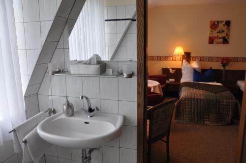 Ванна кімната в Hotel 4 Hufen