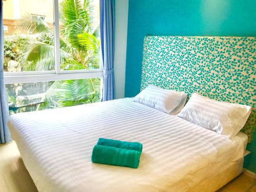 En eller flere senge i et værelse på Atlantis Condo & Resort by Luxury Collection Apartment