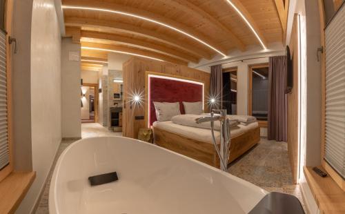 Posteľ alebo postele v izbe v ubytovaní Appartement Zillertal Klee mit Restaurant KleemenTine